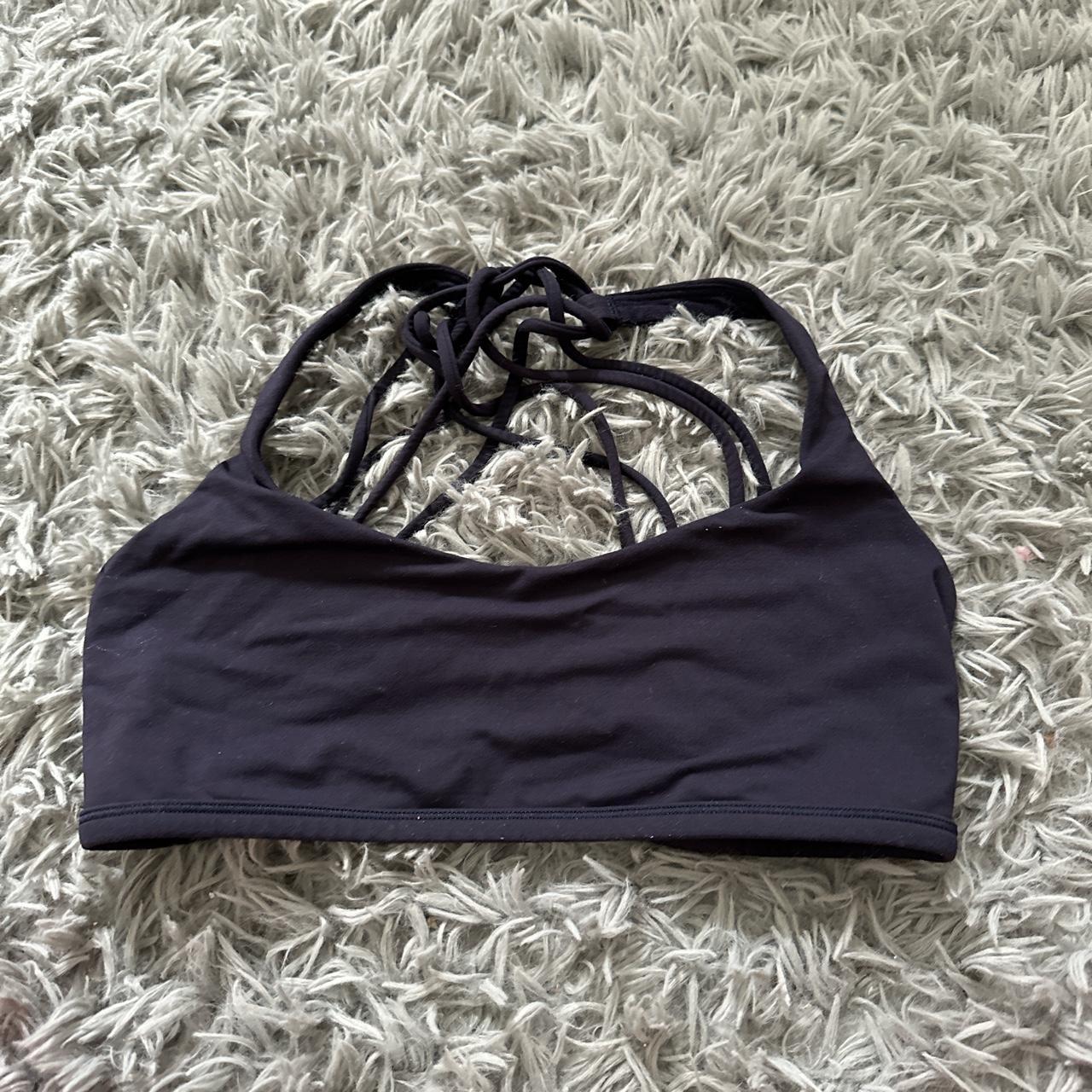 navy blue sports bra from lululemon labeled size 6 - Depop