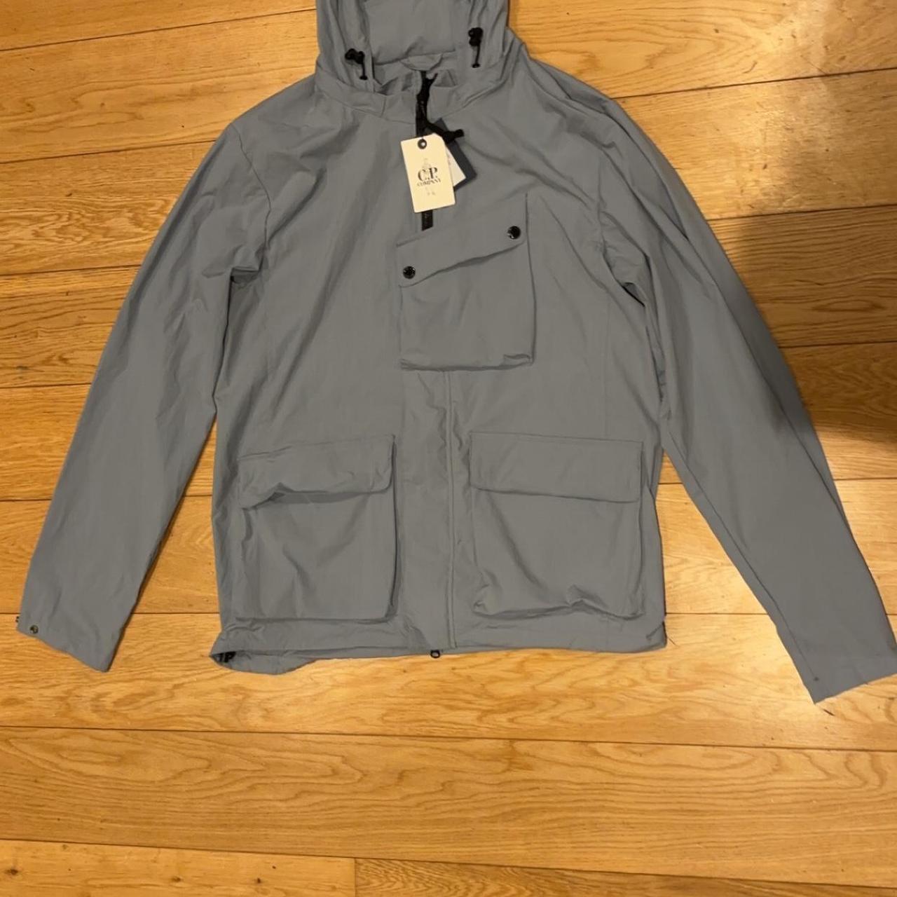 Cp grey coat Brand new with tags Never worn... - Depop