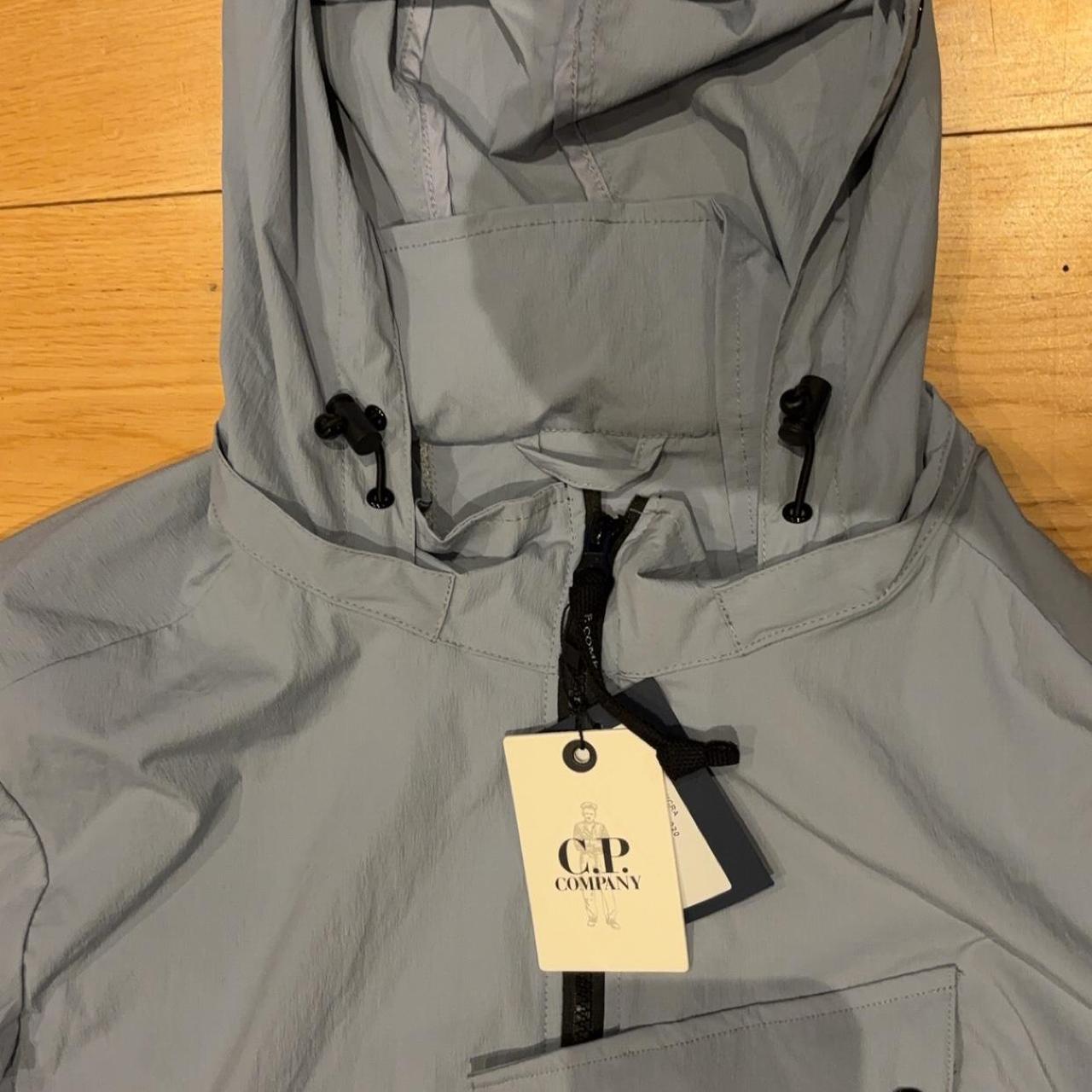 Cp grey coat Brand new with tags Never worn... - Depop