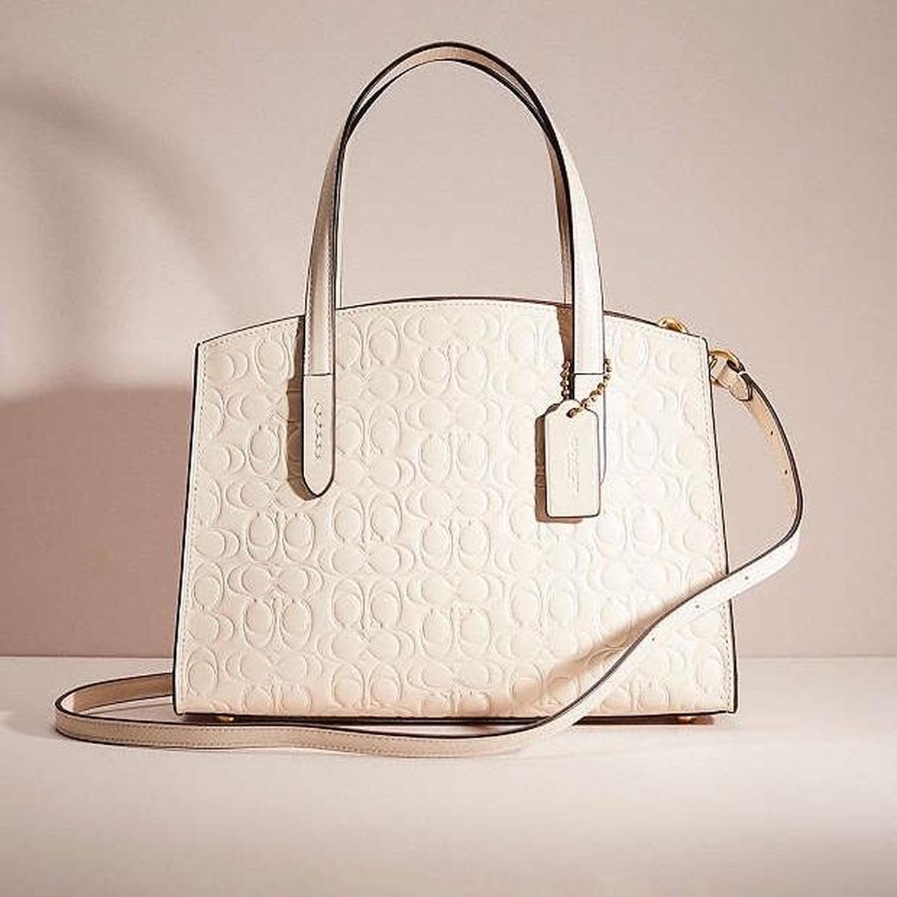 Coach charlie carryall 28 signature online