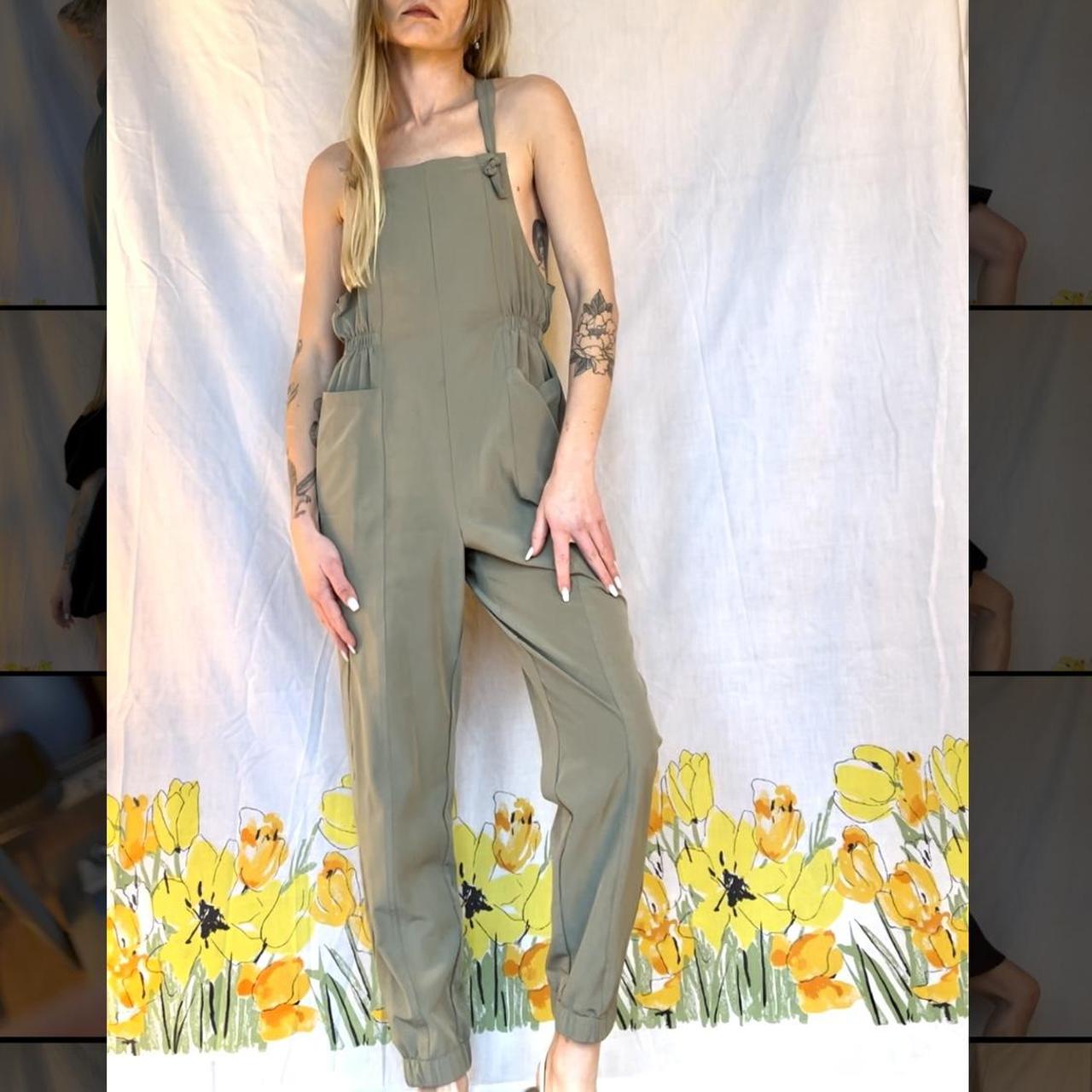 Light-weight sage green jumpsuit. Elastic ankles,... - Depop