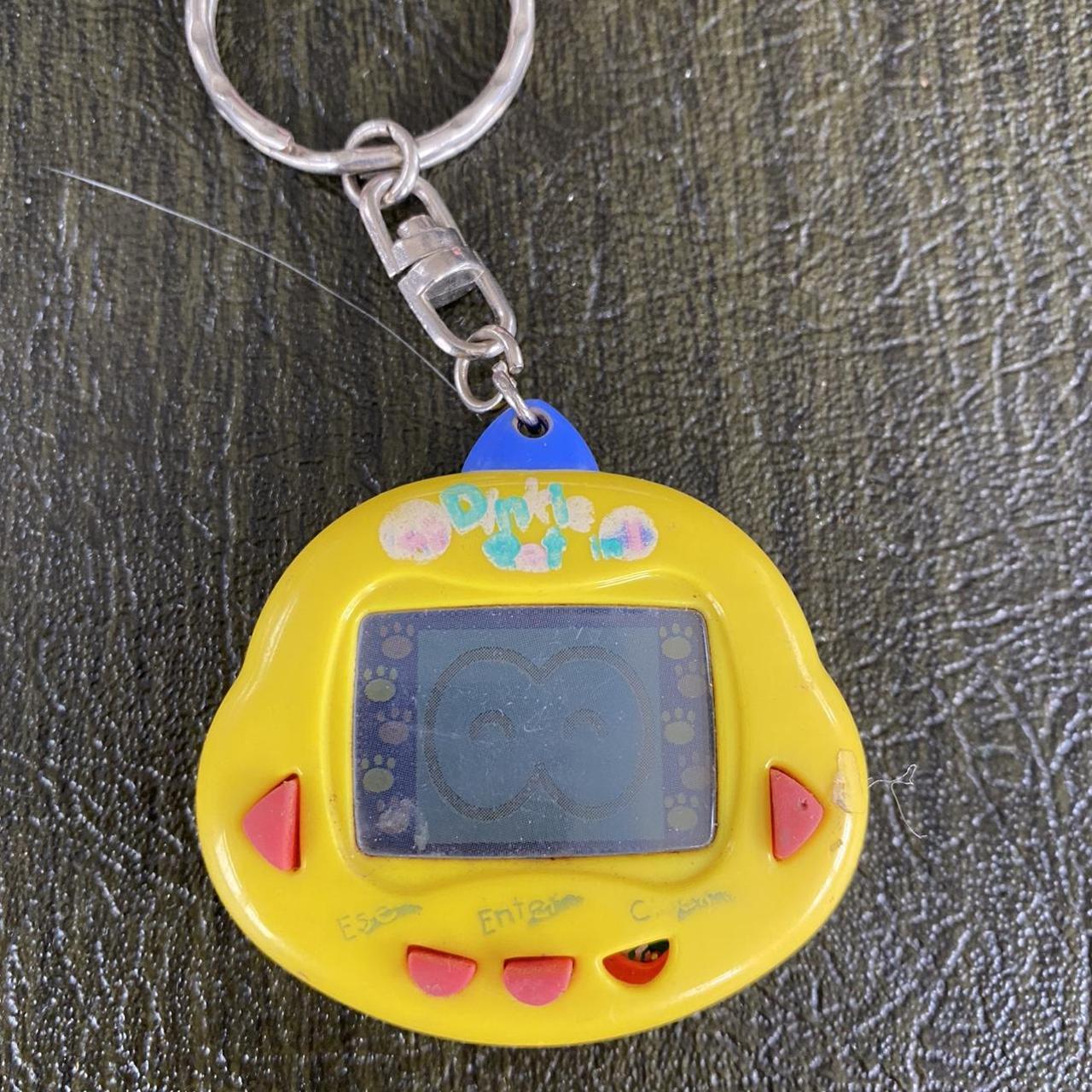 Vintage Tamagatchi Keychain *NOT WORKING FOR DECOR... Depop