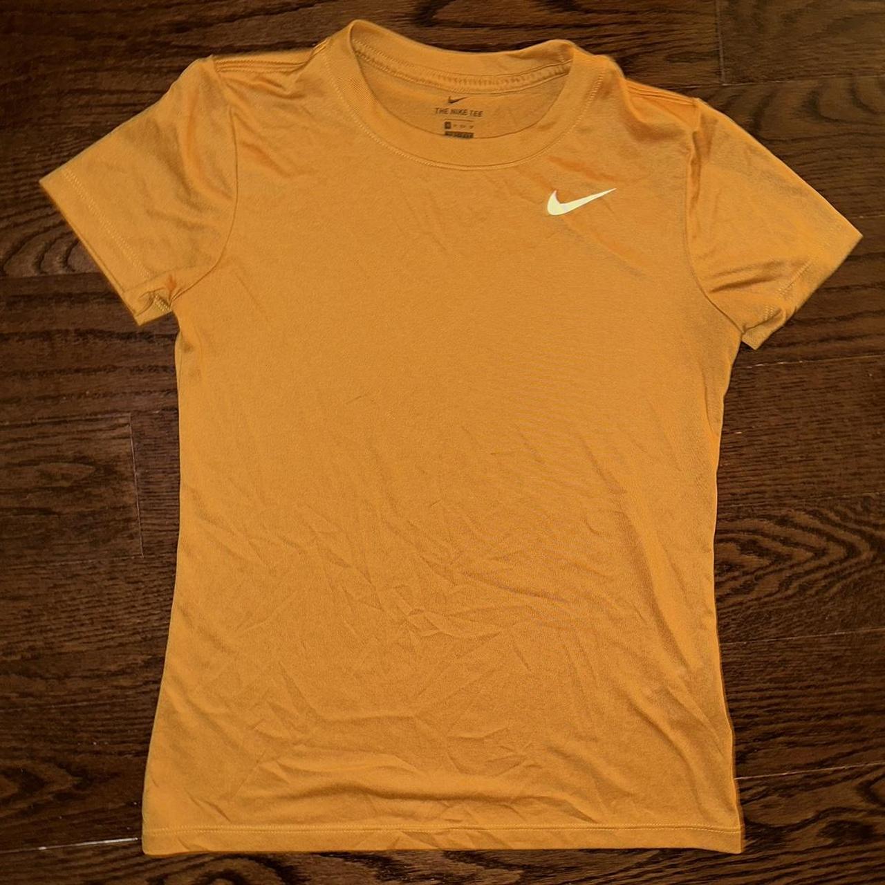 university gold nike shirt