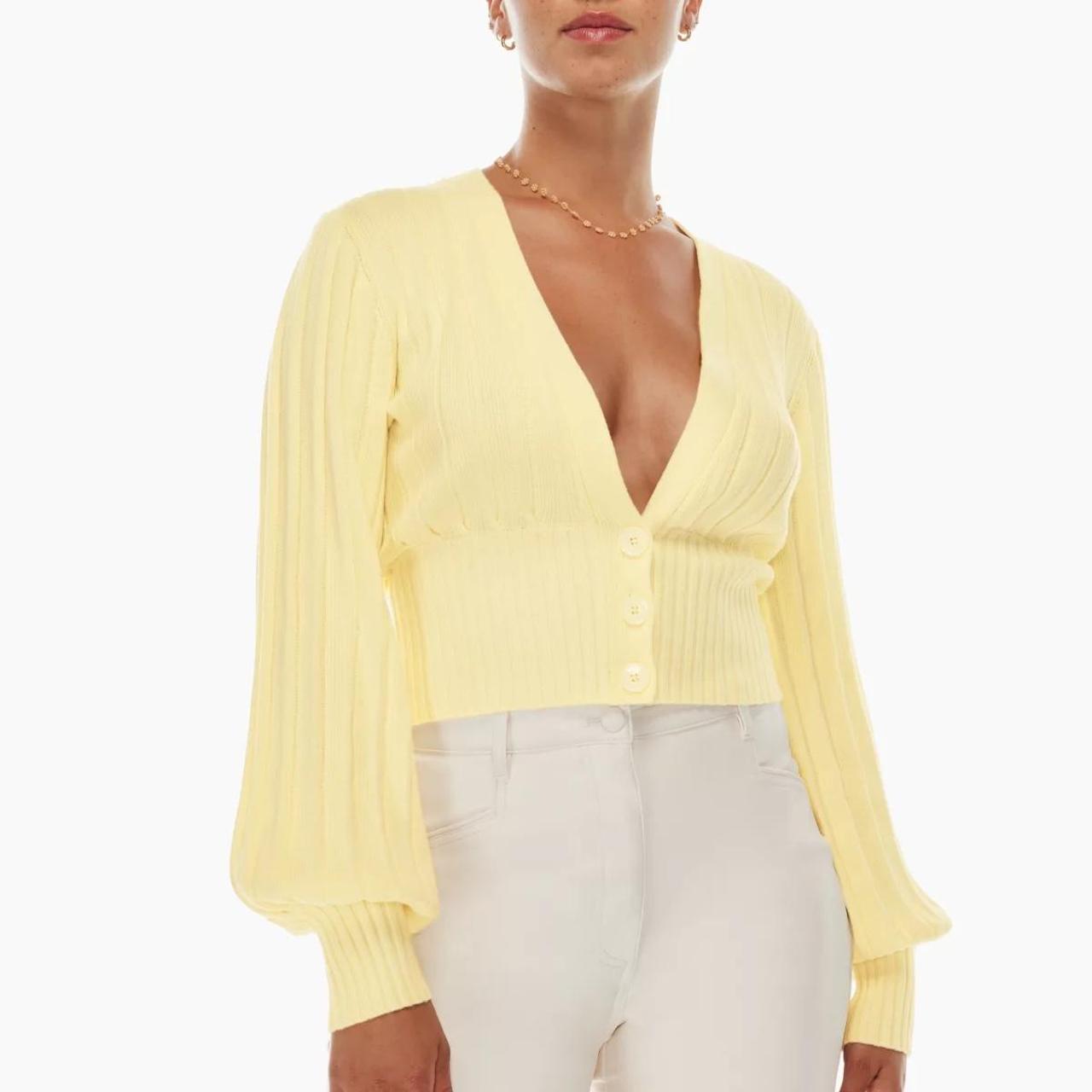 Wearing the plunge cardigan in a small, with the tna butter
