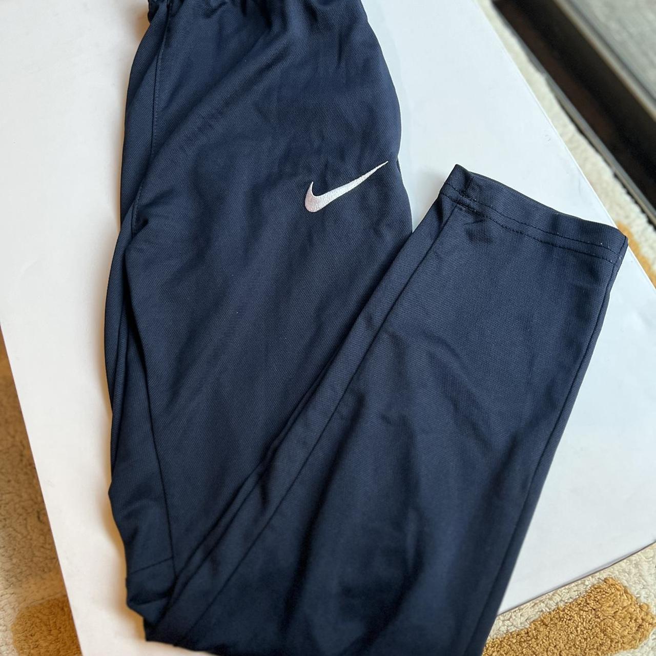 Nike DriFit tracksuit pants navy size M in kids Depop