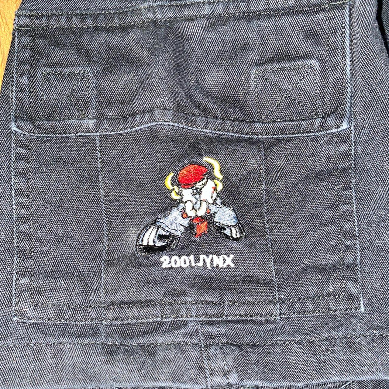 2001 y2k Jynx jort shorts with cool emboidered man | Depop 2001 y2k Jynx jort shorts with cool emboidered man | Depop