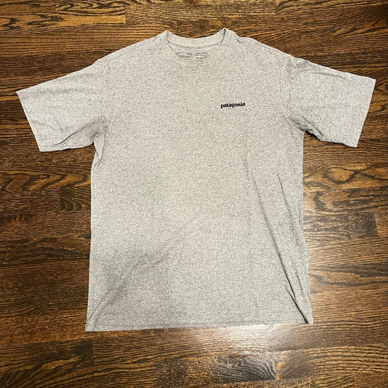 Patagonia mens grey t-shirt with big logo in back... - Depop