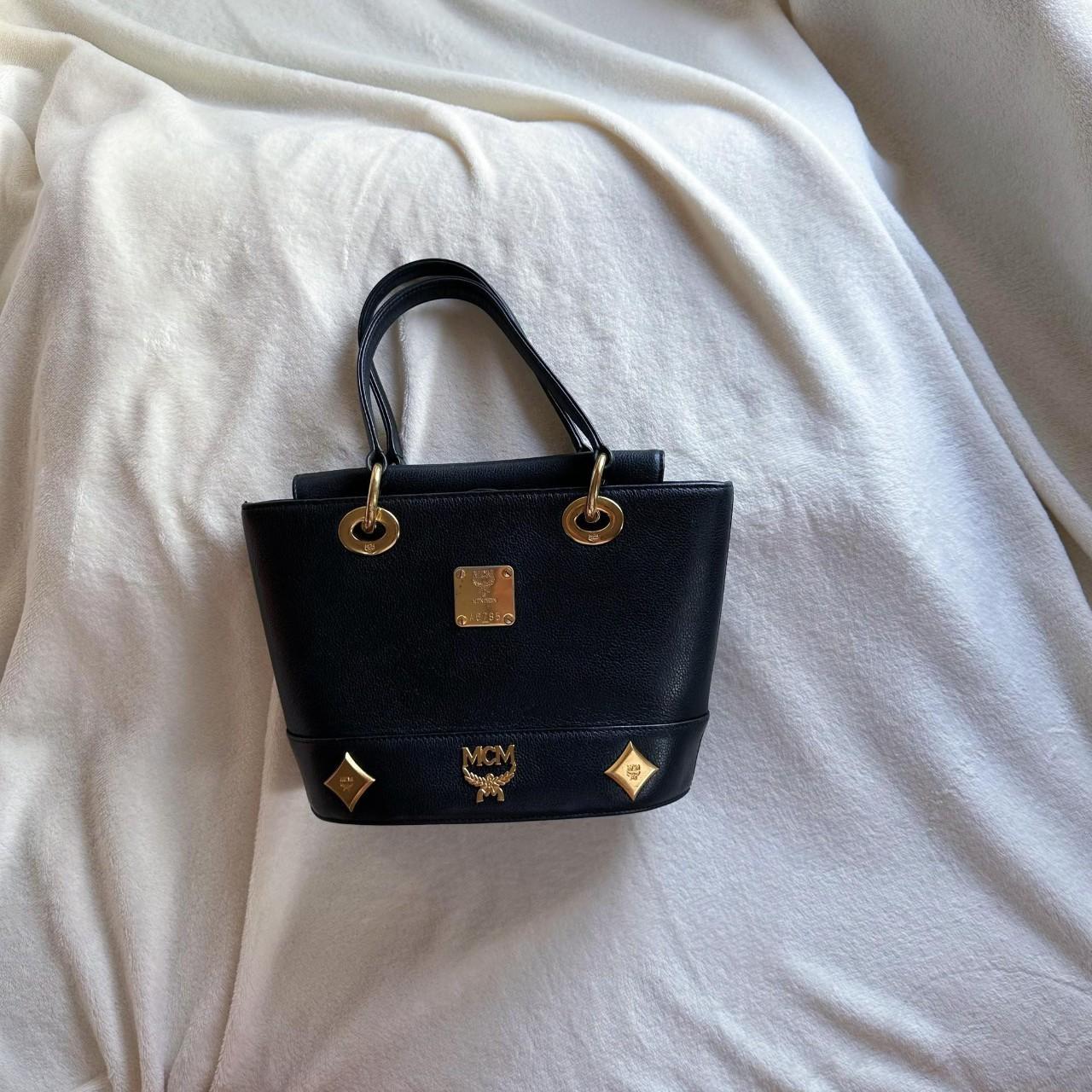 mcm bag barely used, perfect condition comes with - Depop