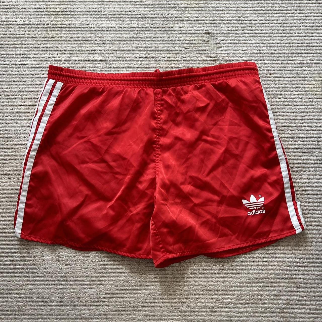 Red adidas shorts on sale