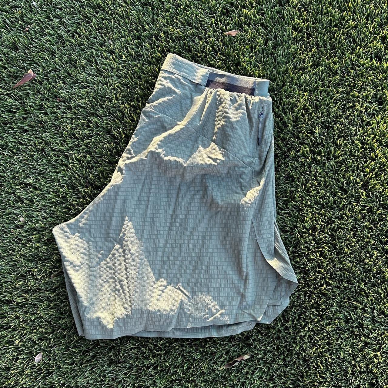 Green Lululemon Surge shorts. Designed so the bottom... Depop
