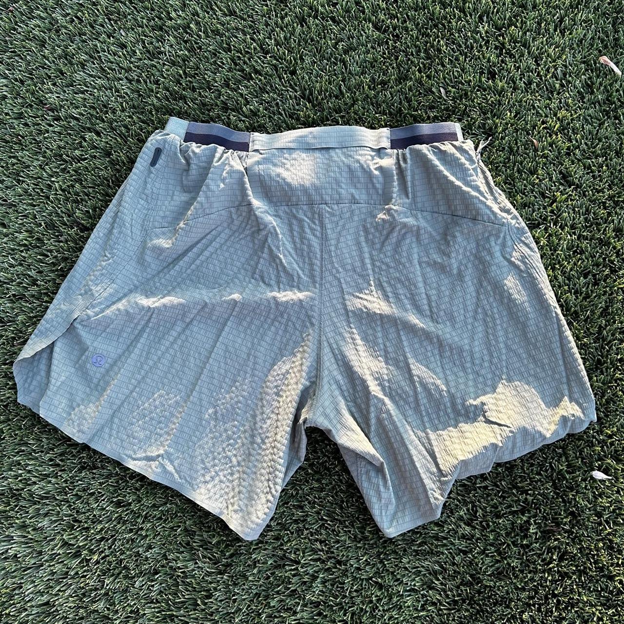 Green Lululemon Surge shorts. Designed so the bottom... Depop
