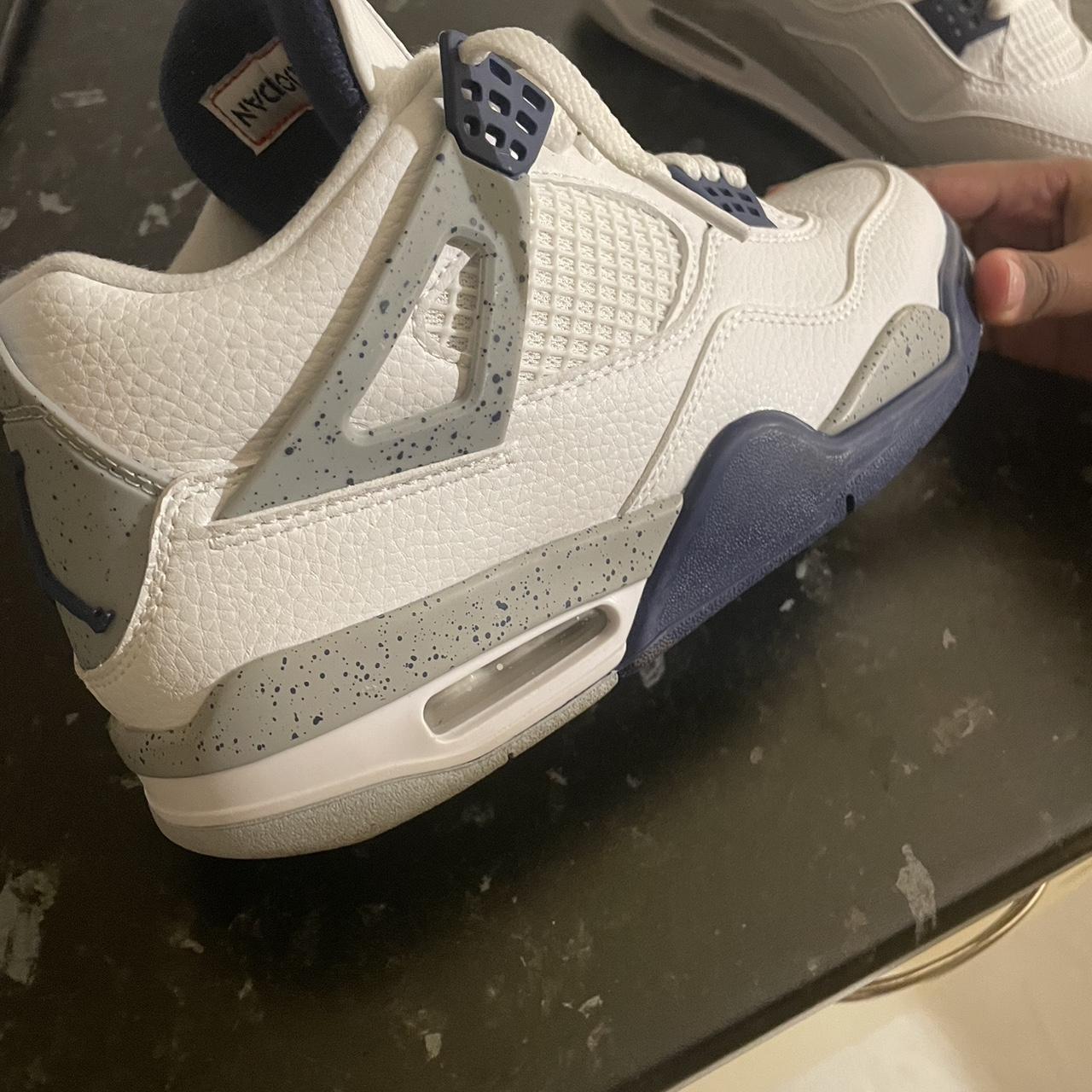 midnight blue jordan 4