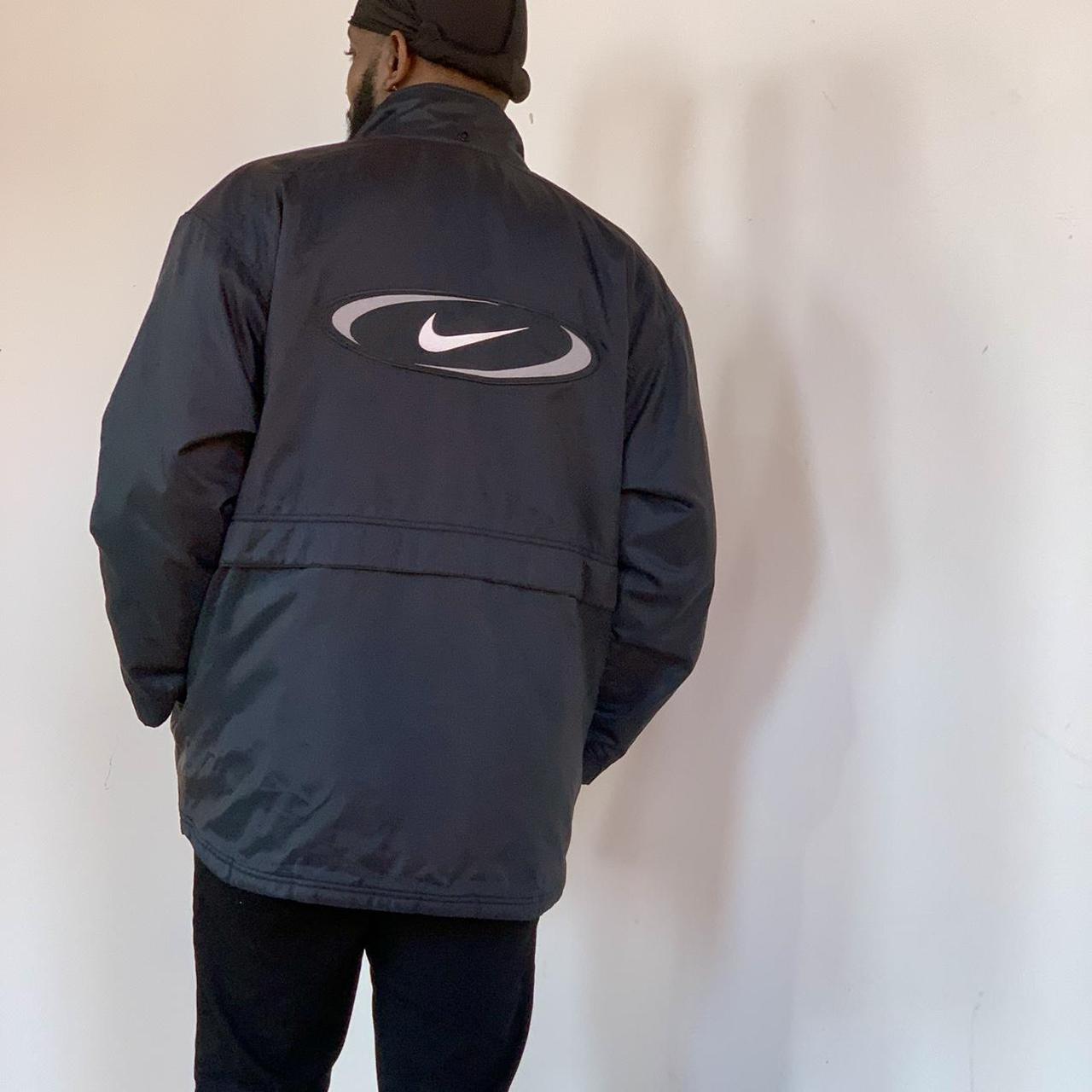 Stylish Oversized Nike Winter Coat in classic black,... Depop