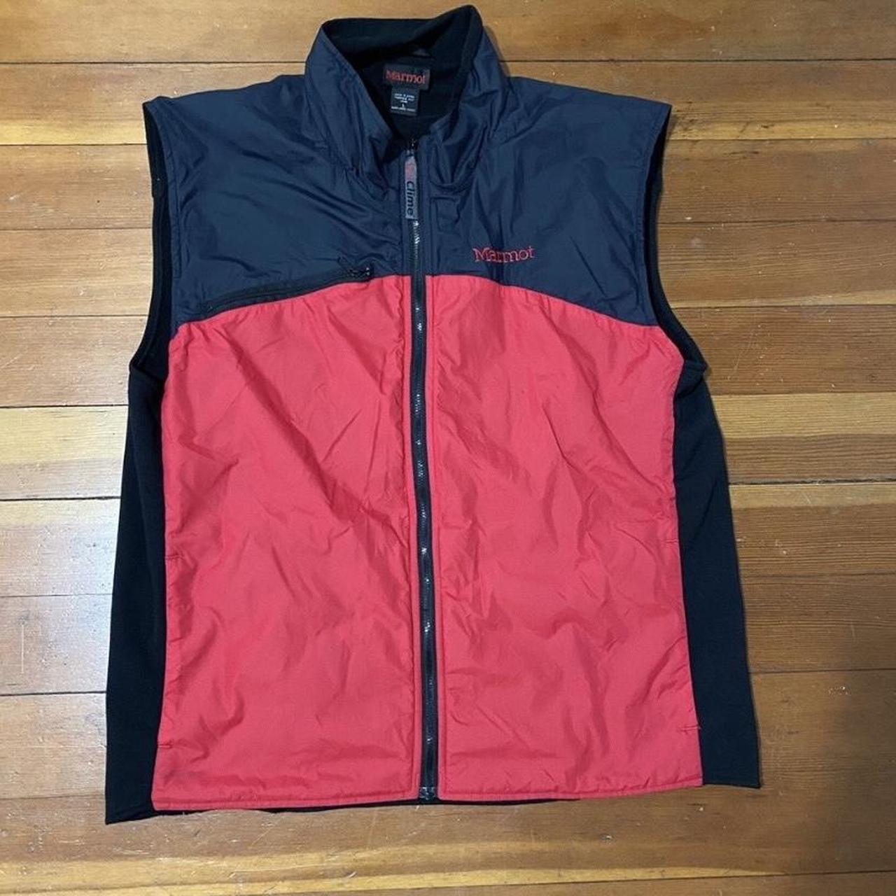 Large Marmot vest. It has a rain jacket front and a... - Depop