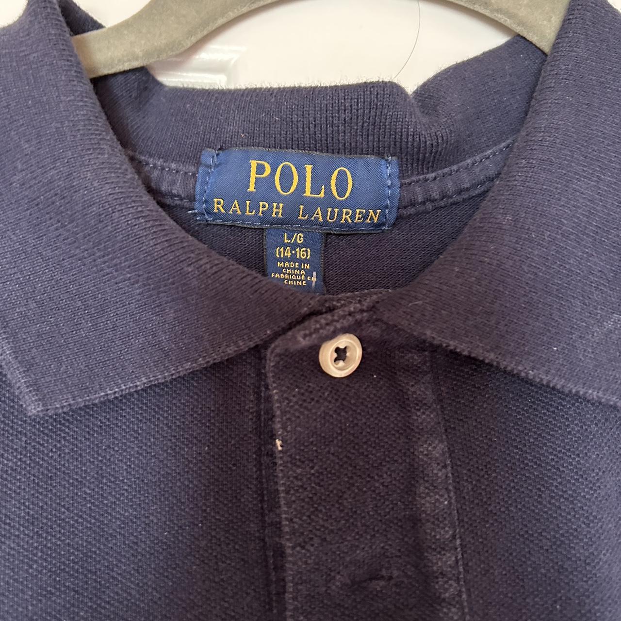 Ralph Lauren polo shirt. Boys size large 14-16 navy... - Depop