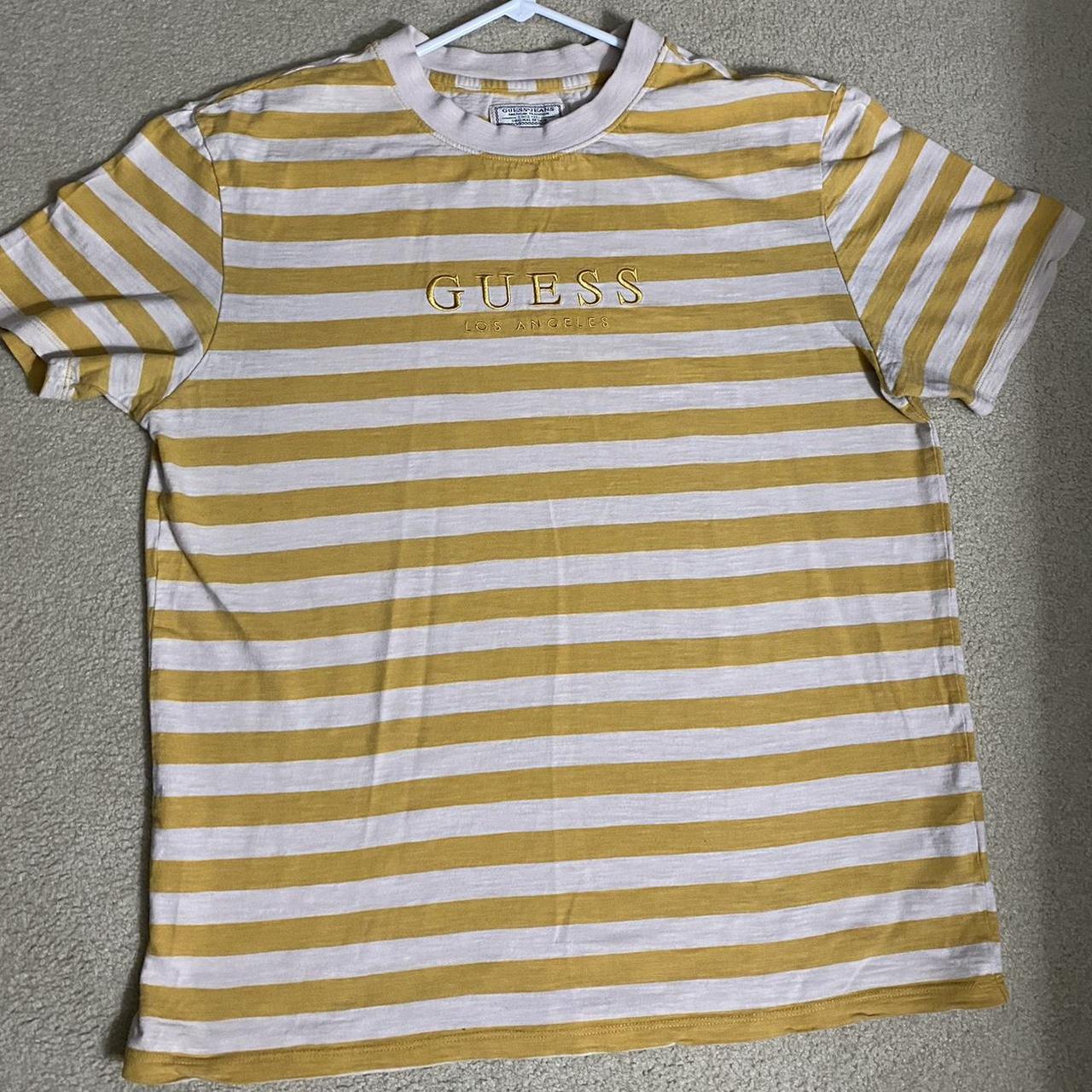 yellow and white guess shirt