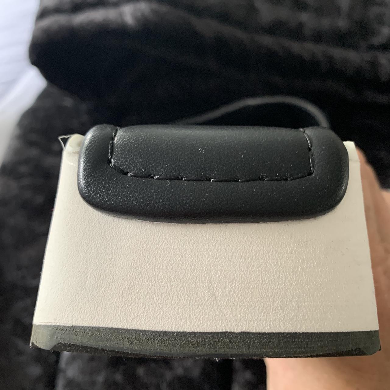 DKNY Women's Black and White Slides Depop