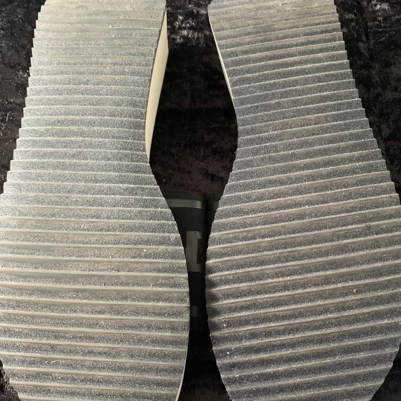 DKNY Women's Black and White Slides Depop