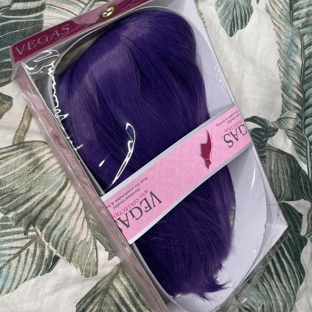 Purple synthetic wig with bangs, includes attached... Depop