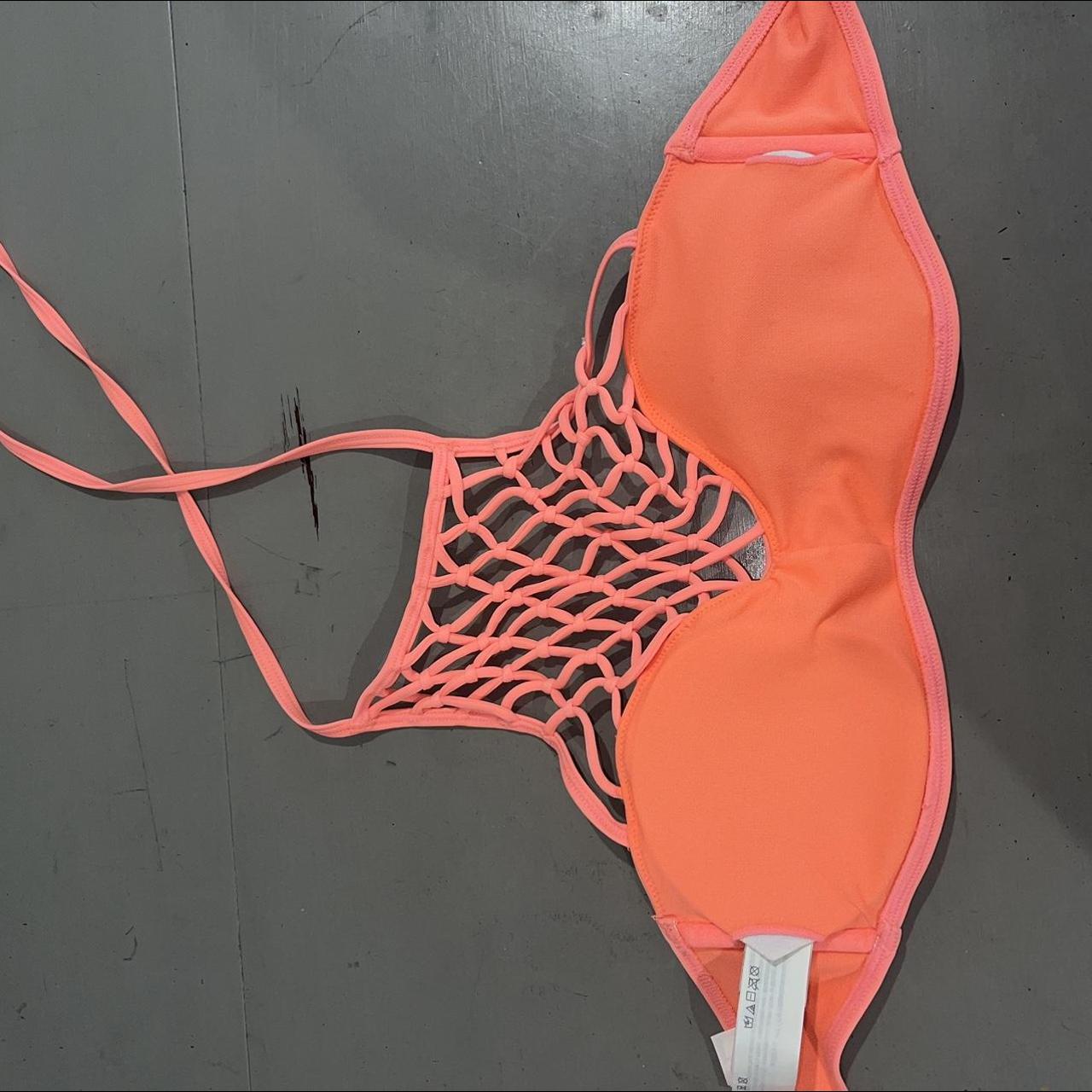 Bright orange/coral Hollister bikini top. Size... Depop