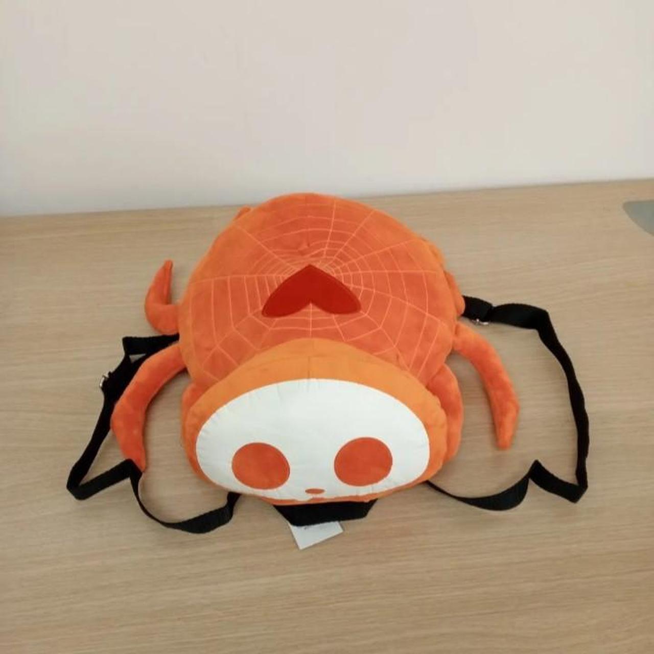 Offers Skelanimals Orange Timmy Glow-In-The-Dark Plush Backpack