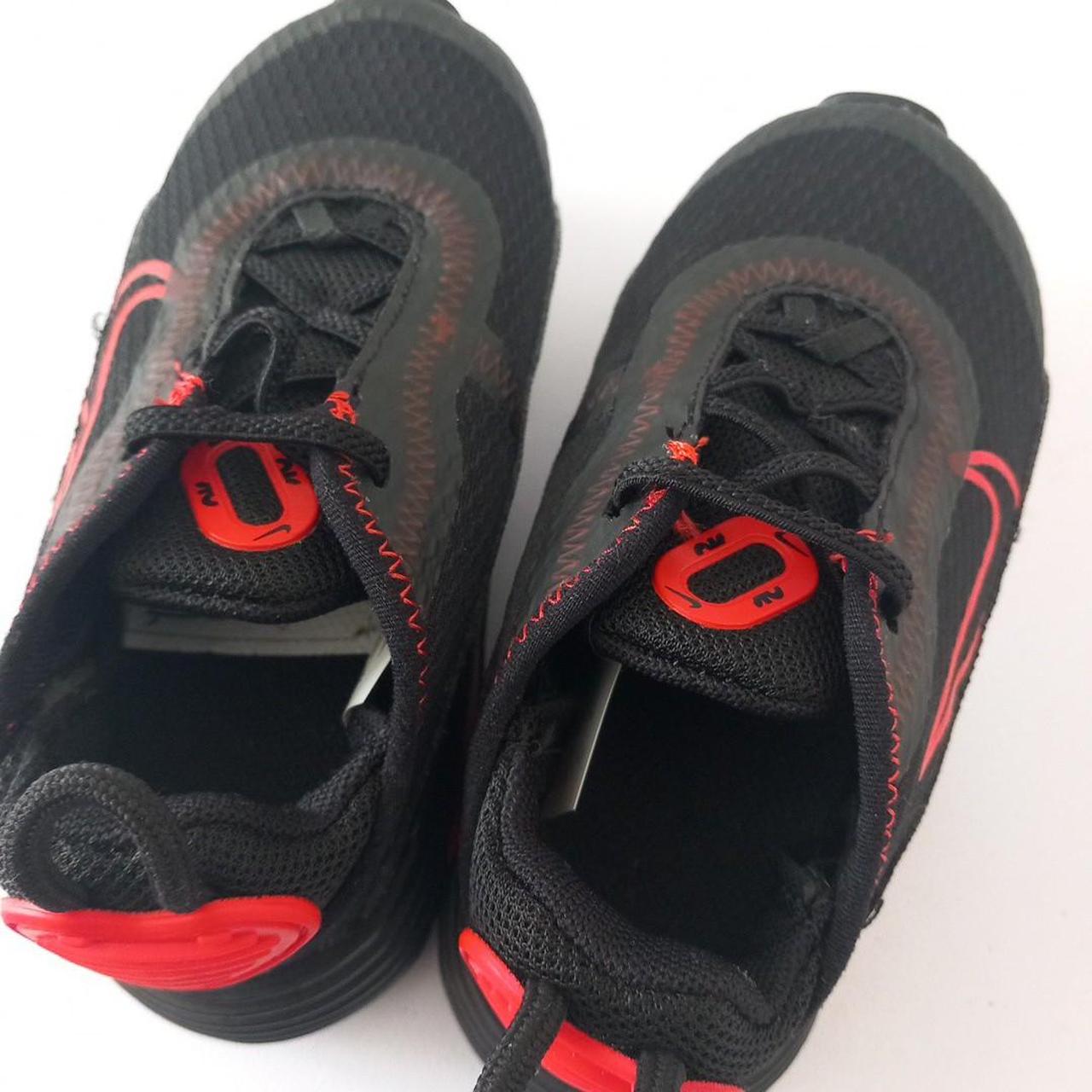 boys all black nike trainers