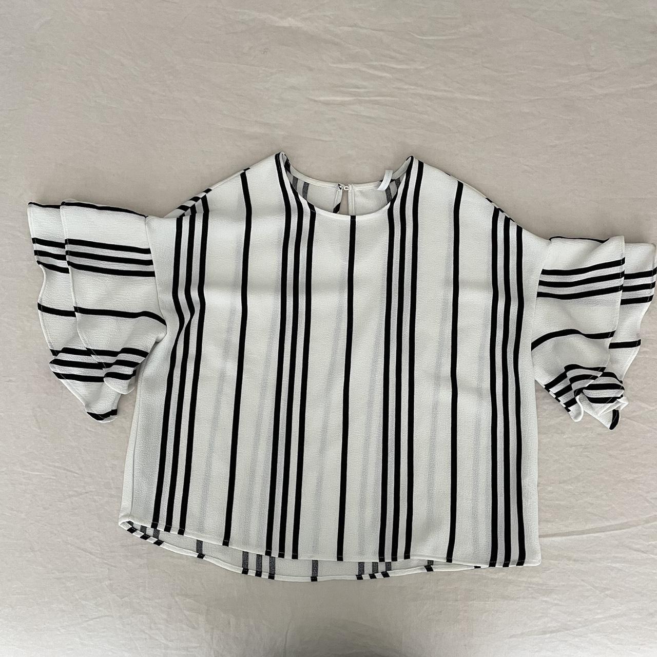 Grayson Threads white and black stripped work blouse. Depop