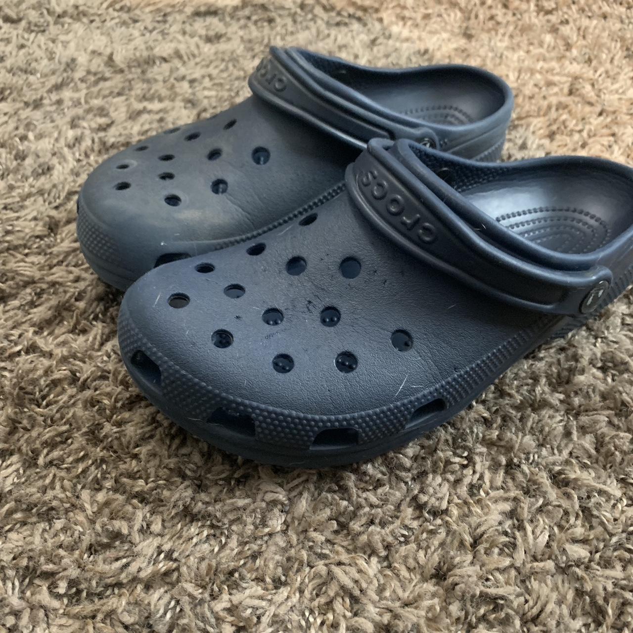 Dark blue Crocs size 7 men 9 womens Logo is faded... - Depop