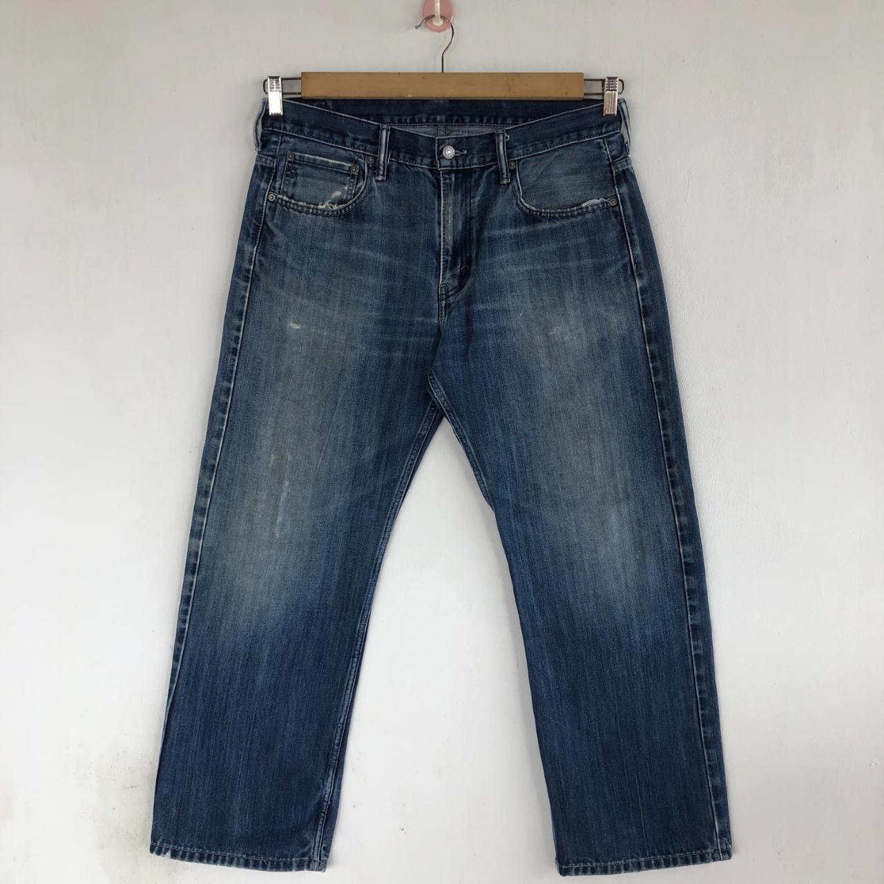 Levis 569 ripped jeans best sale