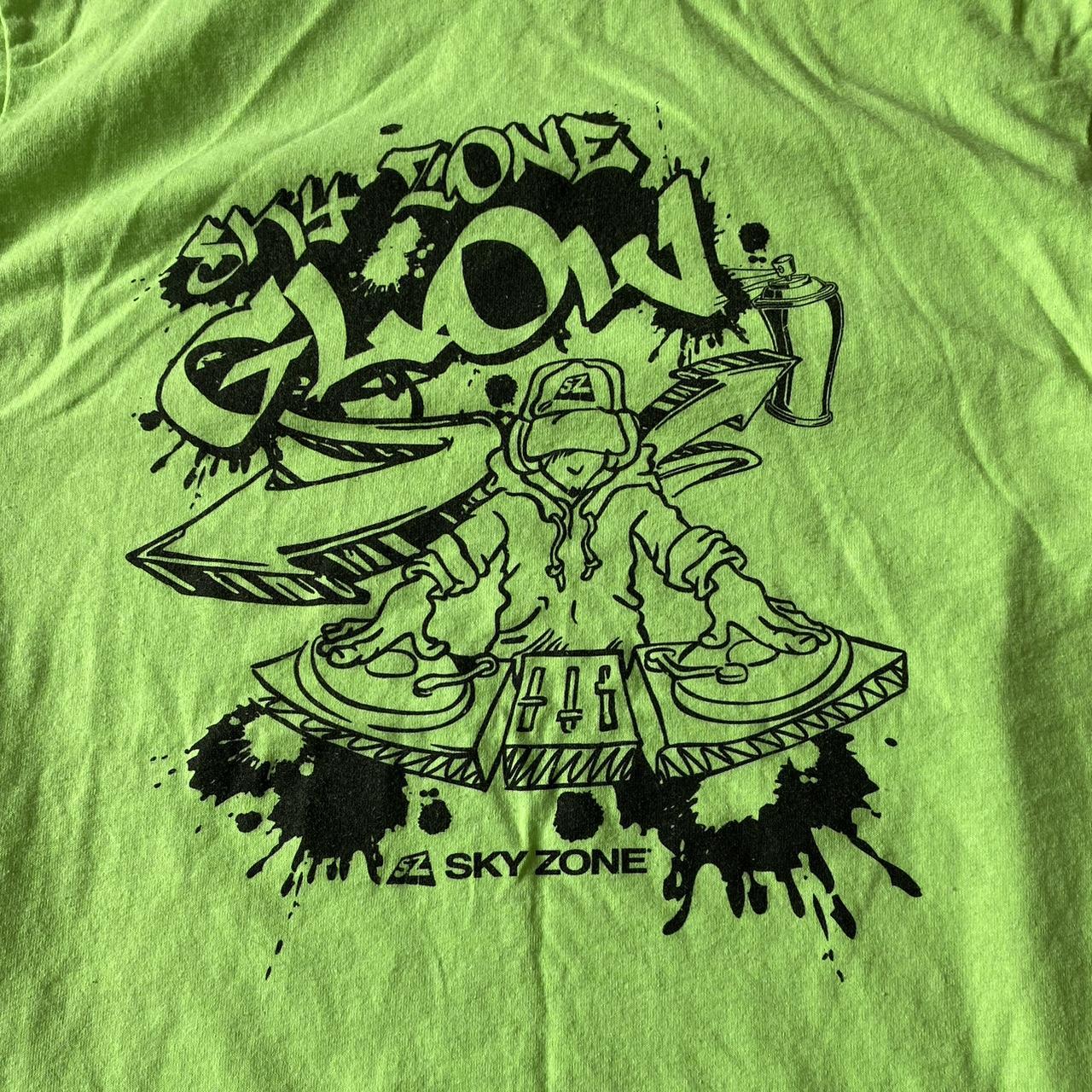 sky zone glow skater tshirt size S color green,... Depop