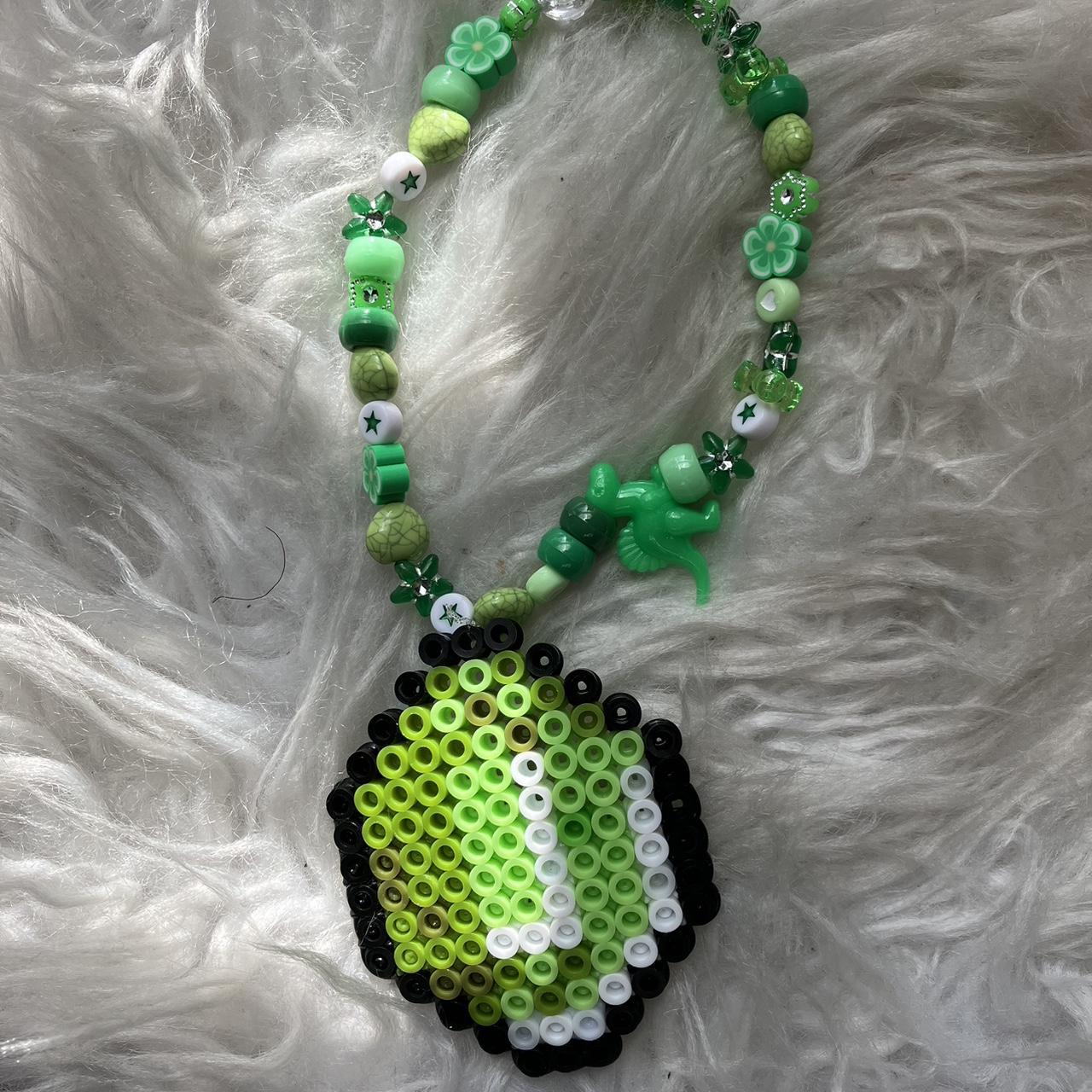 This is a Kandi bracelet Its a Minecraft emerald... - Depop