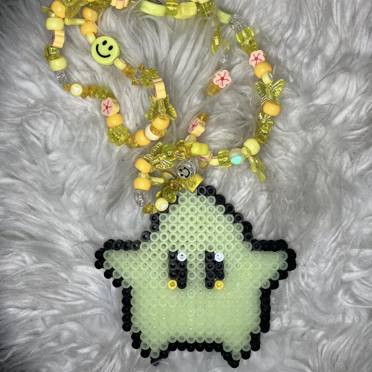 This is a Kandi bracelet Its a Minecraft emerald... - Depop
