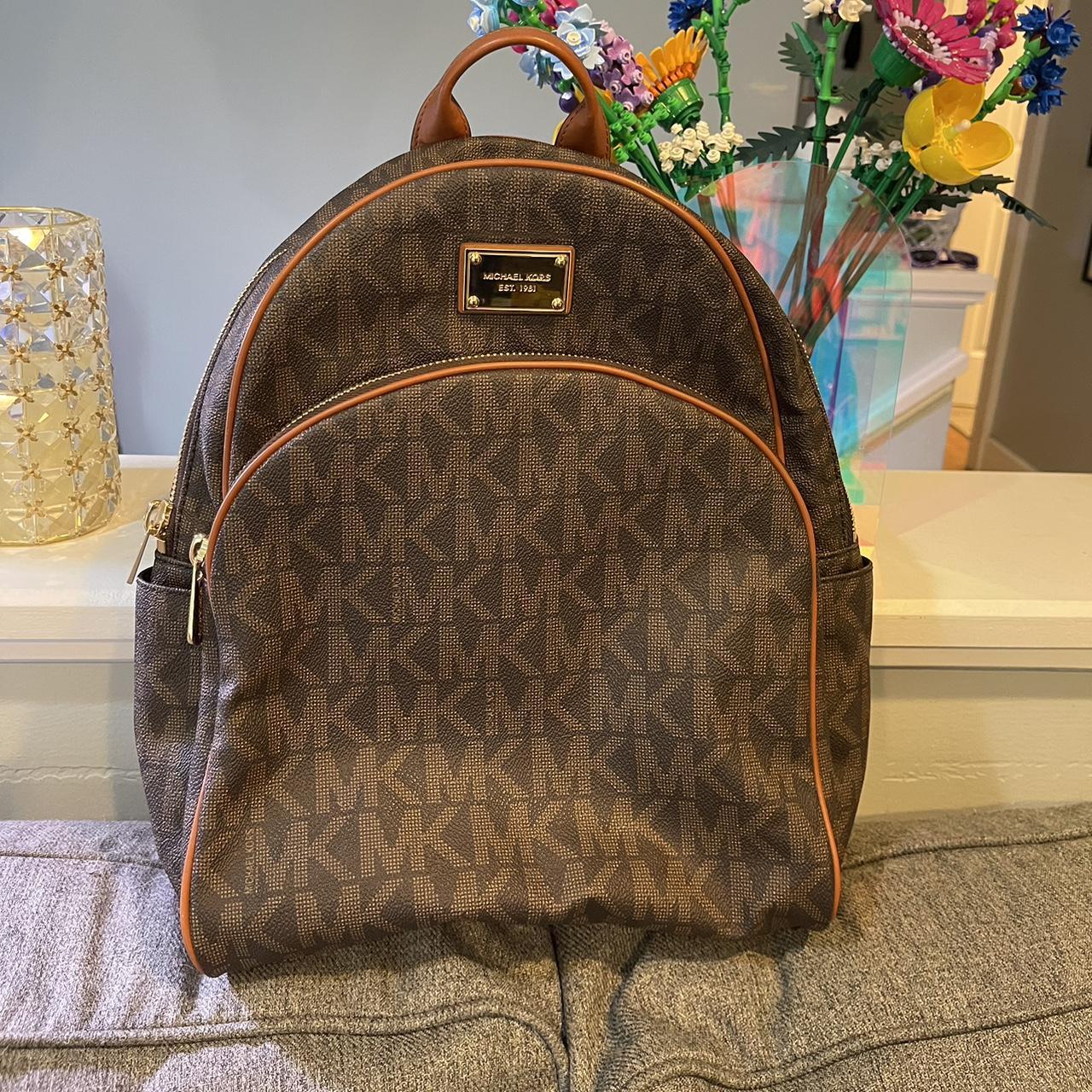 Brown and tan Michael Kors Saffiano leather backpack