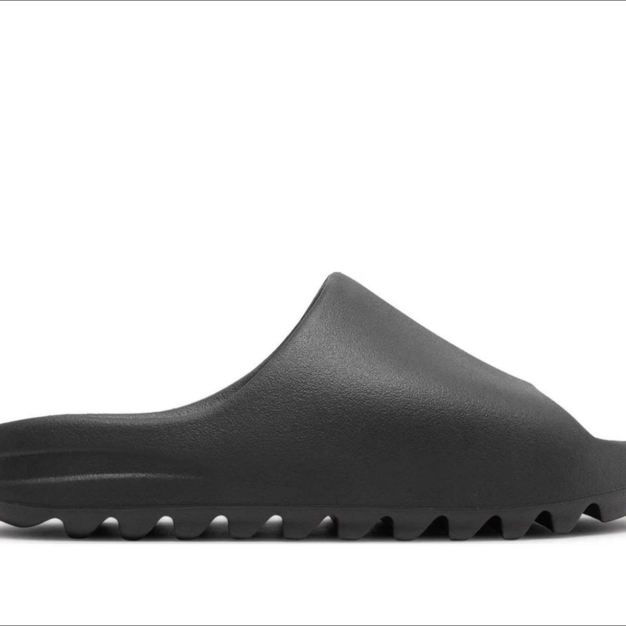 yeezy slides black size 12uk never worn Depop