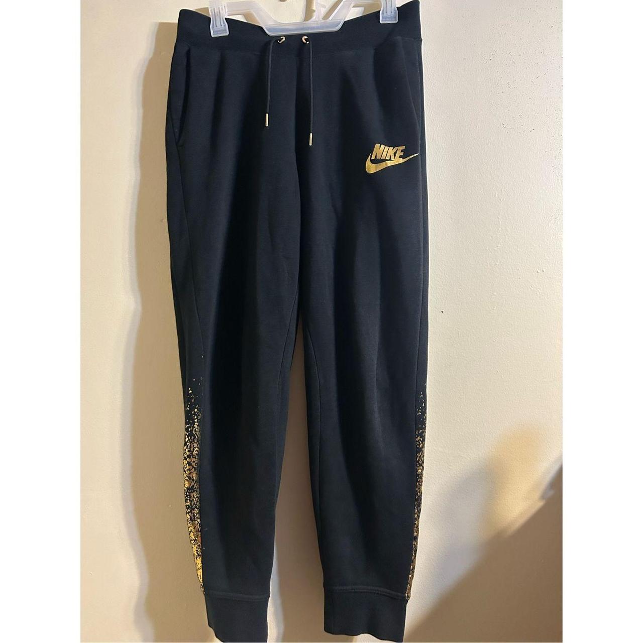 Black and gold nike sweats best sale