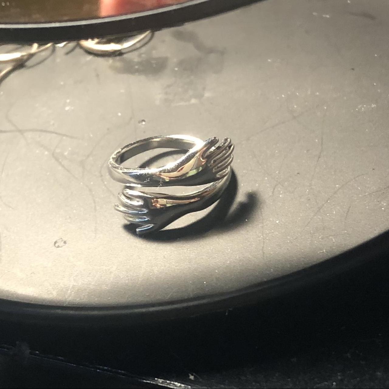 Adjustable hugging silver ring. From Soothe Rings... Depop