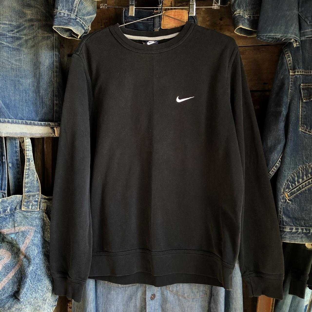 Black Nike crew neck size L Has a little fading and... - Depop