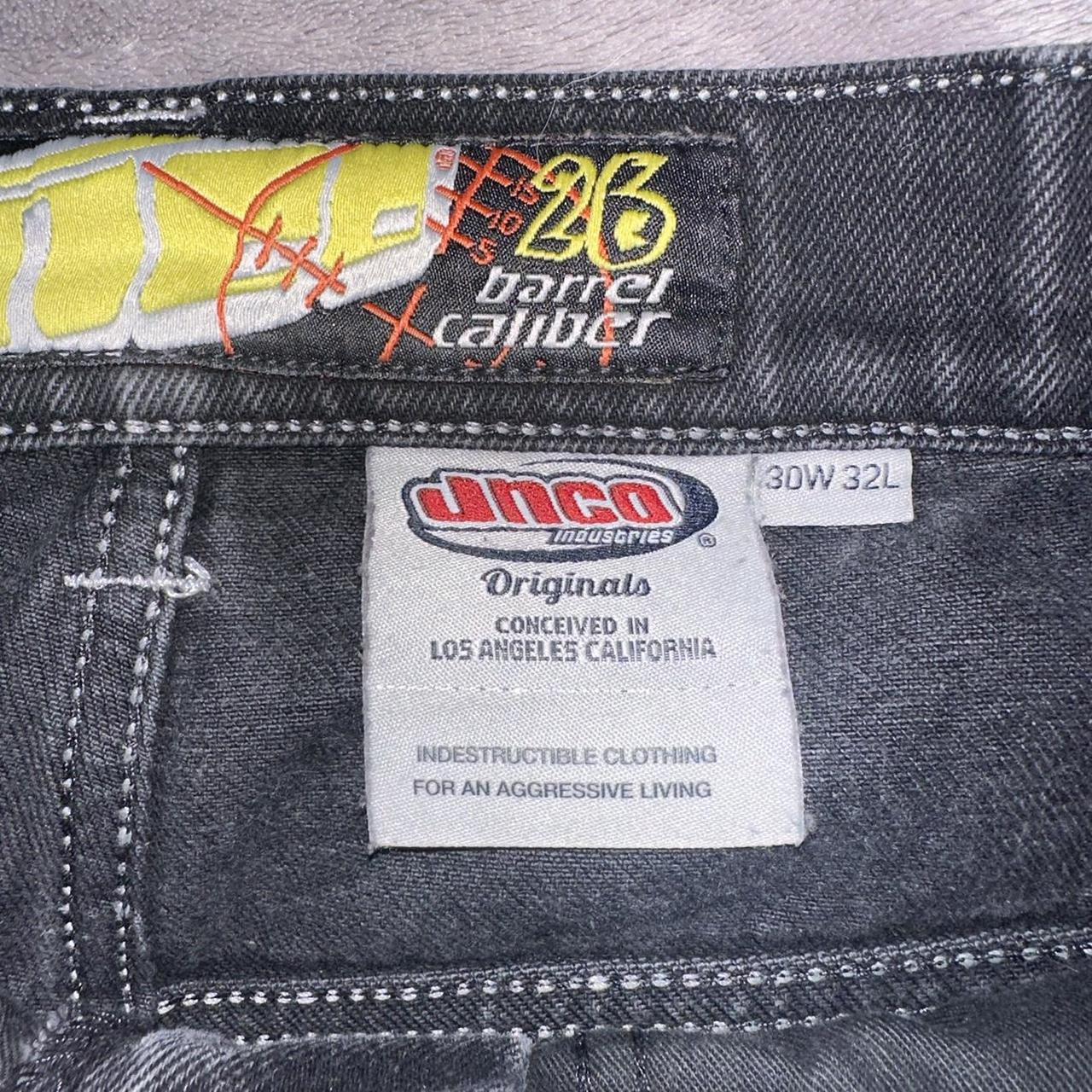 black twin cannon jncos, sized 30W 32L, torn up at black twin cannon jncos, sized 30W 32L, torn up at