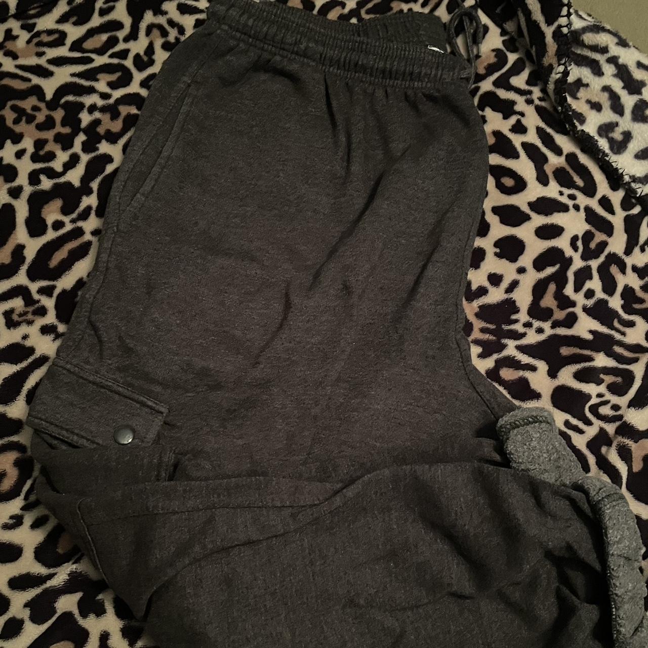 Charcoal grey cargo champion sweat pants, size 2xl... - Depop