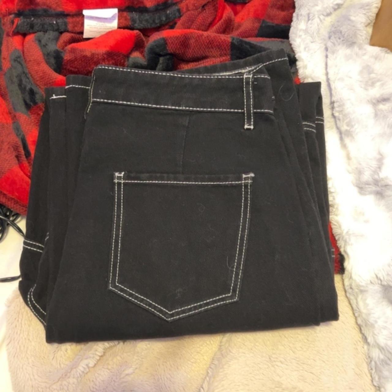 Black pants with red sales stitching