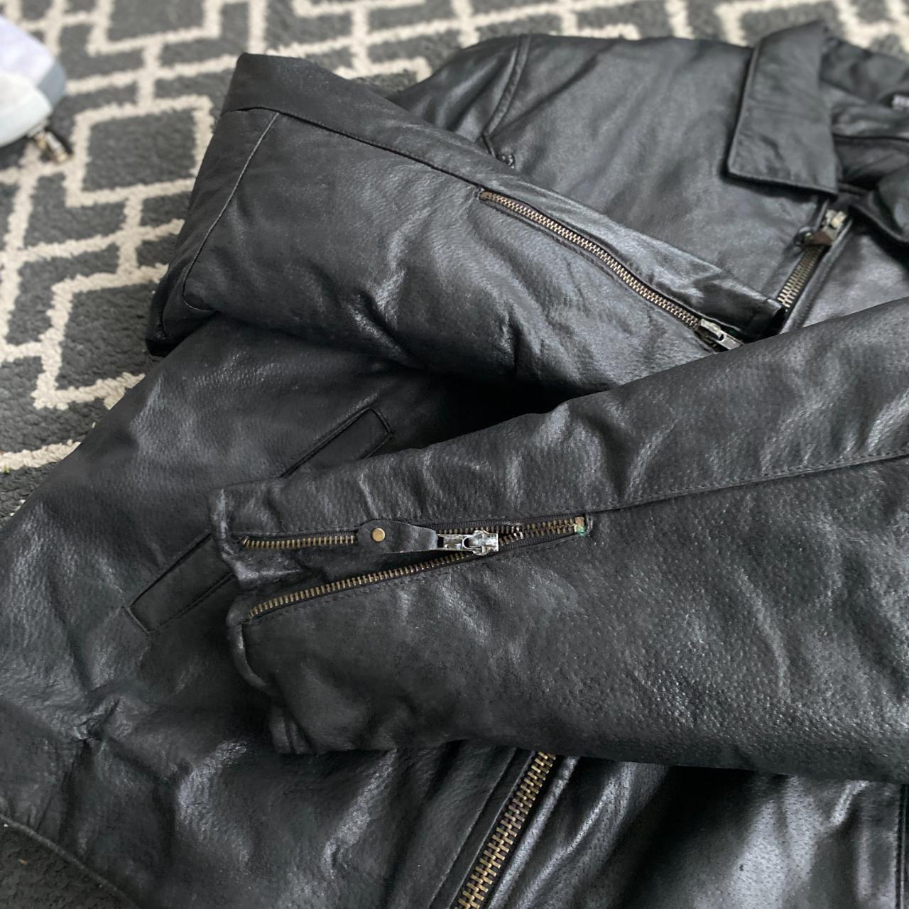 real nice heavy leather jacket has some... - Depop