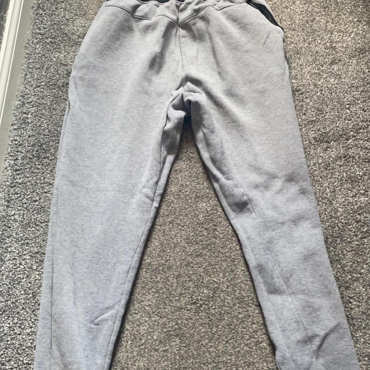 Dark Grey Nike Joggers with Black waistband. Worn a... - Depop