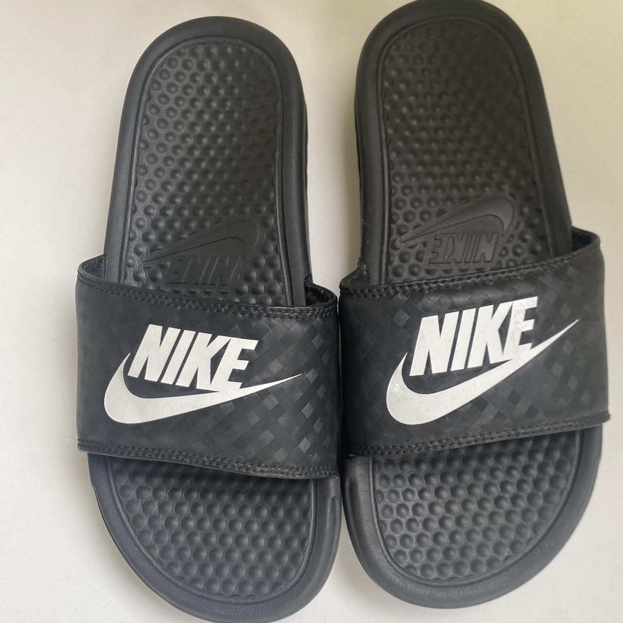 Black and white Nike slides. Worn only a few times.... - Depop