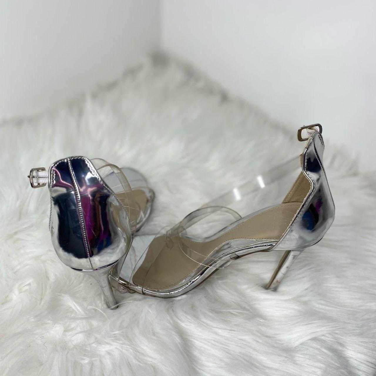 Gently used silver high heeled sandals