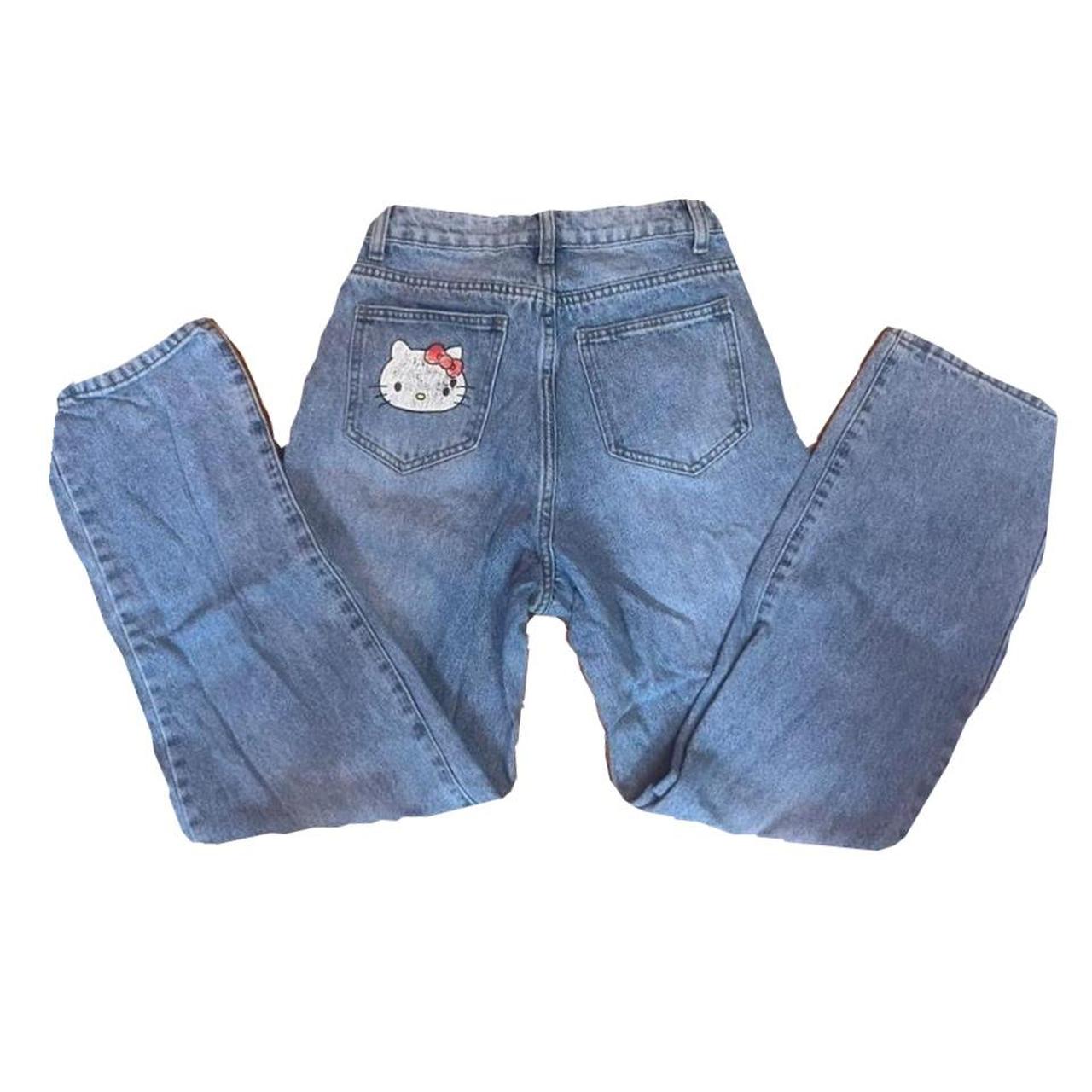 Hello Kitty jeans print is very warn but super cute... | Depop