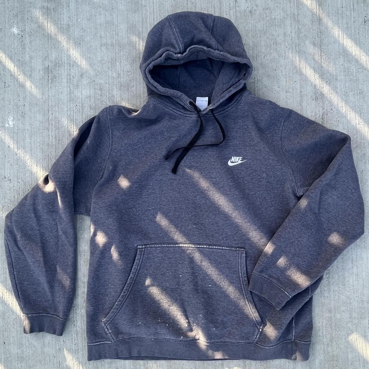 Dark grey Nike hoodie. Minimal distressing on... - Depop