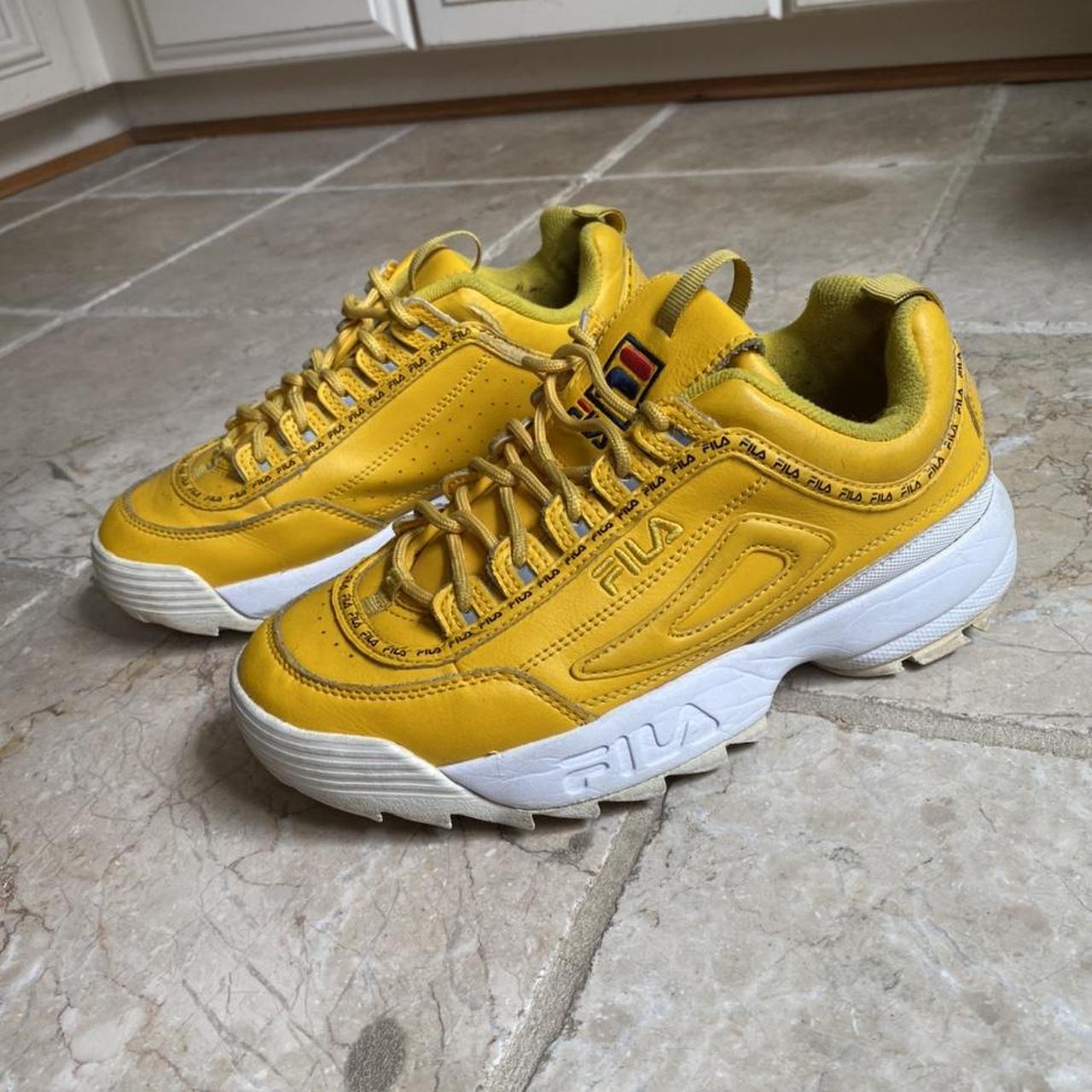 Yellow FILA sneakers size 8.5 in good used. Depop