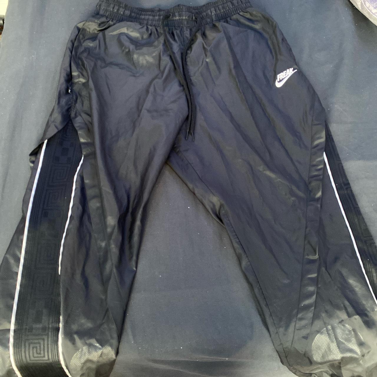 nike freak track pants
