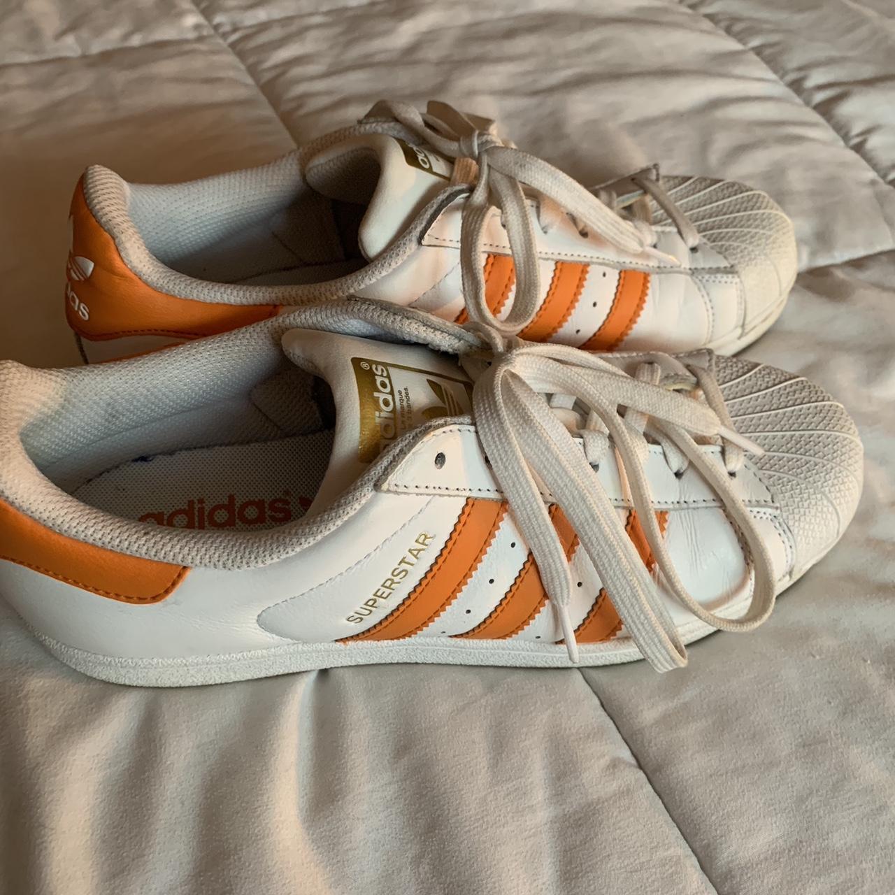 Women’s orange stripe Adidas Superstars. Excellent... - Depop