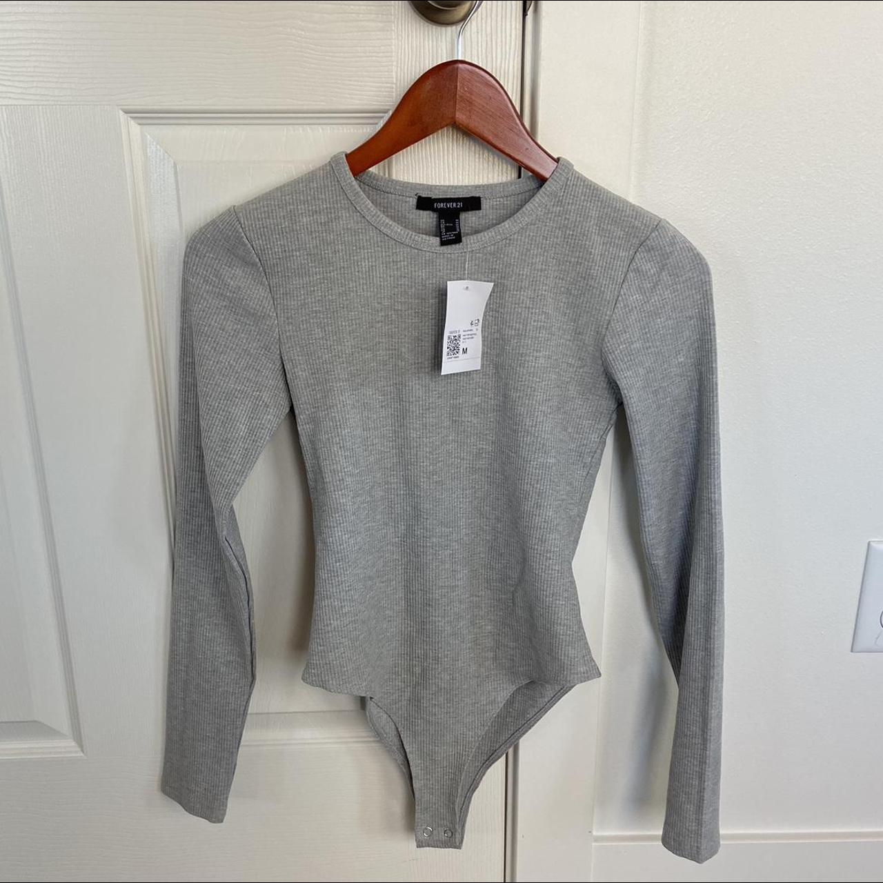 I have two Forever 21 grey ribbed body suits that... - Depop